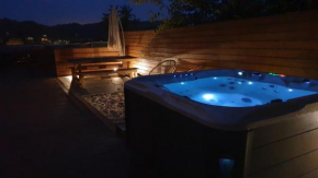 Le Chalet jacuzzi et Détente 4 Étoiles